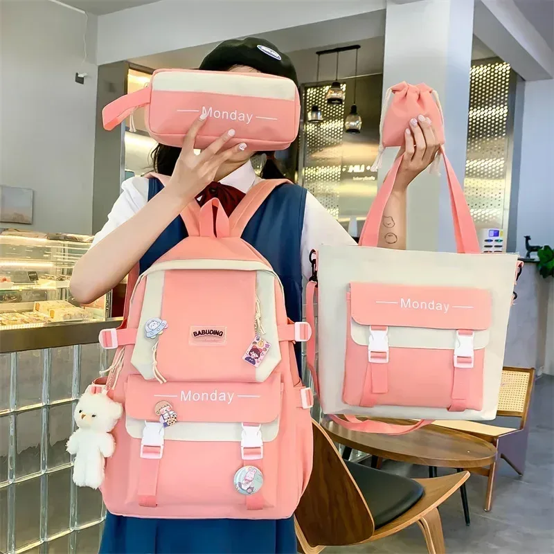 sac dos nylon rose blanc gris latérale monday enfants femmes école bandes fixation poignées pratiques travaux compartiments accessoires ensemble