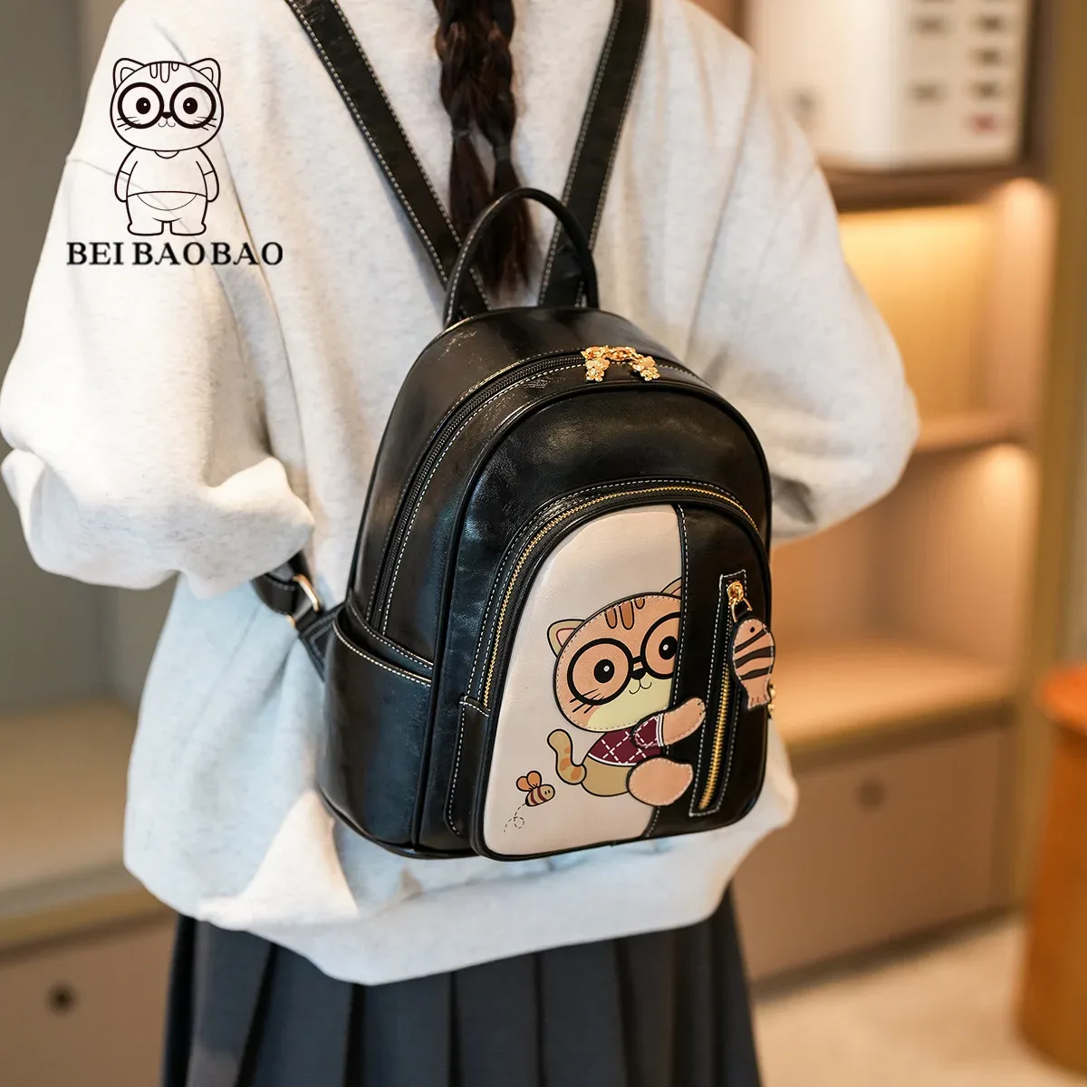 sac dos cuir verno marron beige blanc chat lunettes poisson preppy cadre interne compartiment ordinateur portable ceinture coussin air jacquard