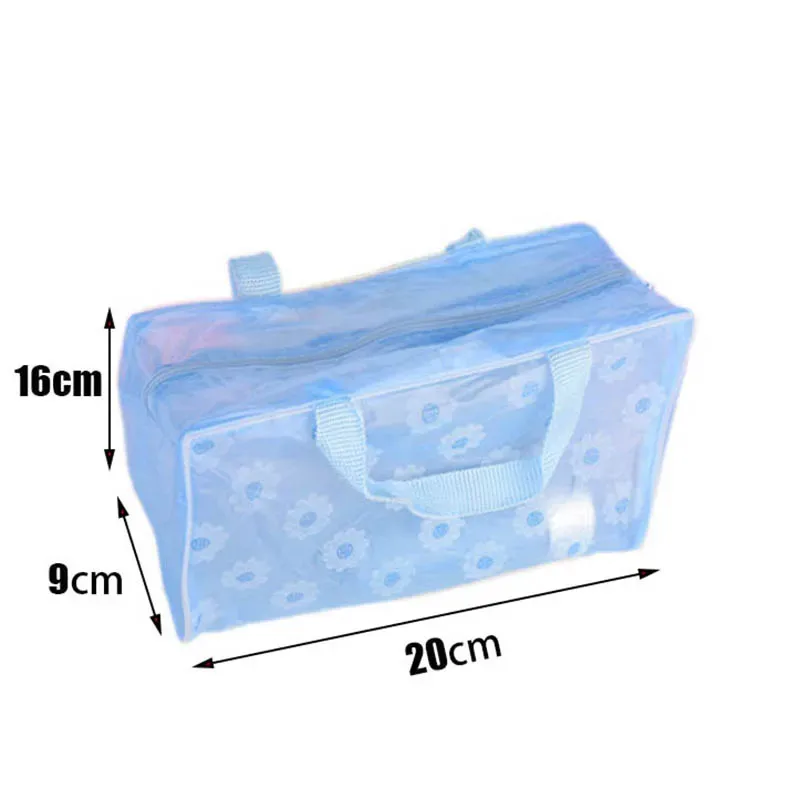 trousse toilette pvc transparent fleur blanche bleu poignée roue format petite valise voyage cosmétique maquillage