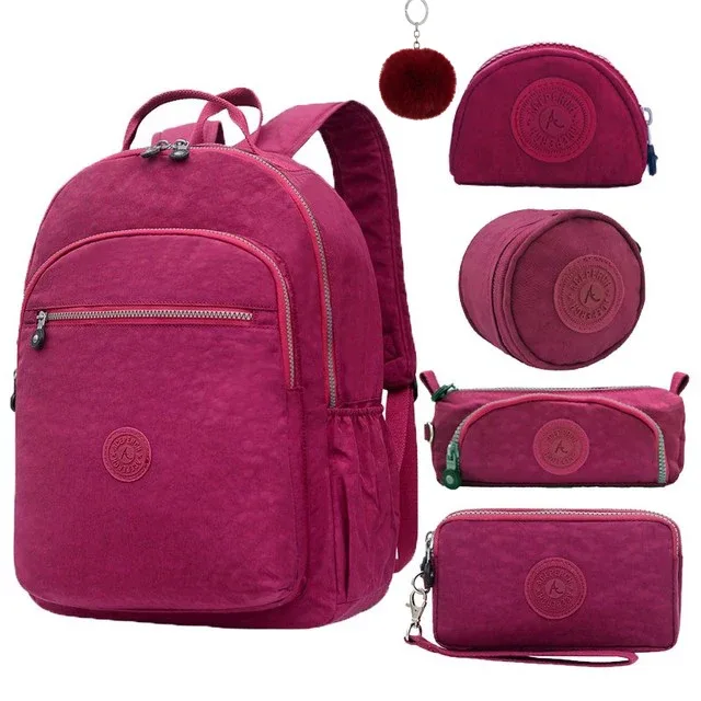 sac dos nylon gris anthracite compartiments poches latérales glissière accessoires pompon porte monnaie voyage école adolescente