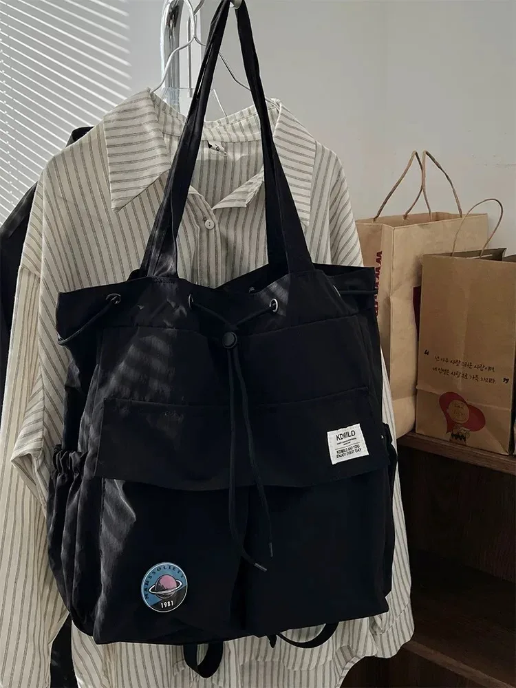 sac à dos léger et décontracté pour femme, idéal pour les voyages, les loisirs en plein air, en nylon, capacité 20-35l, avec compartiment pour ordinateur portable 14 pouces