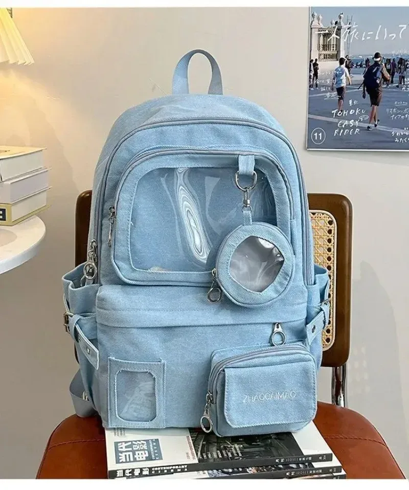 sac dos jean polyester noir bleu beige forme rectangulaire poches latérales transparentes visibilité intérieure informatique ceinture air décontracté usage quotidien