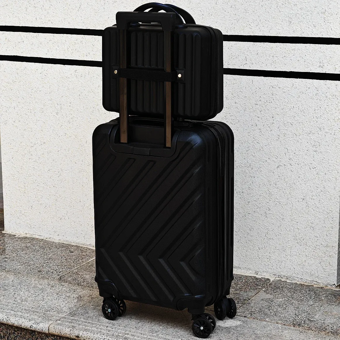 valise abs noir diagonale grand format toupie poignees surdimensionnee voyage familial transport affaires capacité elevee rangement couches roues universelles telescopic