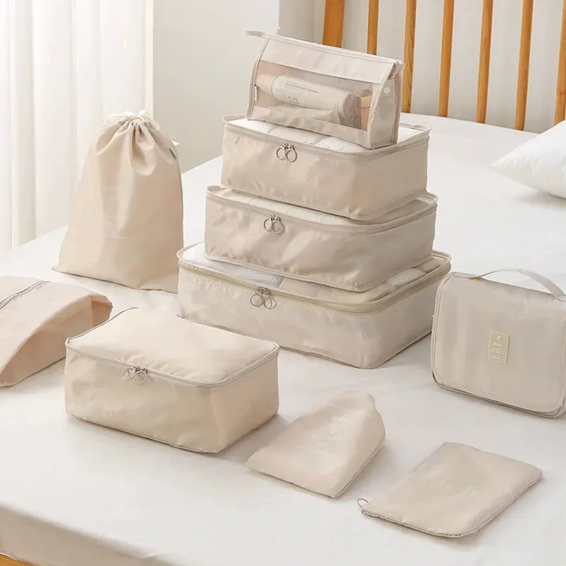 organisateur voyage polyester beige clair compartiments visibilité optimal organisation vêtements chaussures articles toilette sac respirant ventilation séchage rapide set pièces pliable