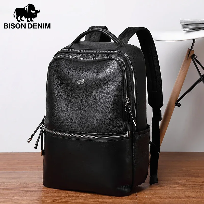 sac dos cuir vache texture rugueuse motif bison noir bandoulière arquée grande ouverture fermeture éclair usage voyage école travail