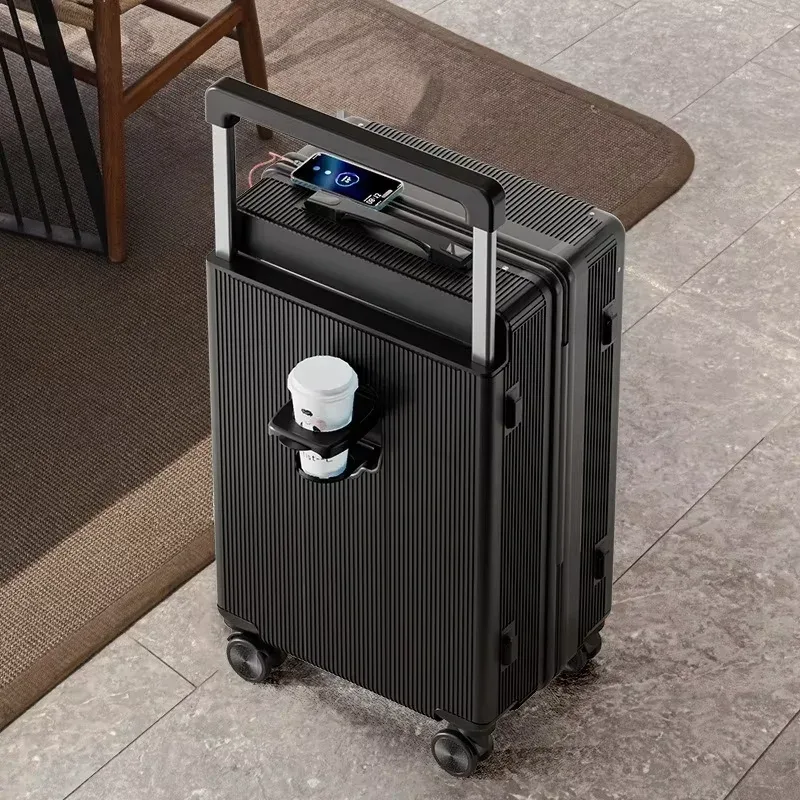 valise bagage roulettes abs beige clair marron toupie poignées bouton forme rectangulaire surface lisse texturée grande capacité usage voyage