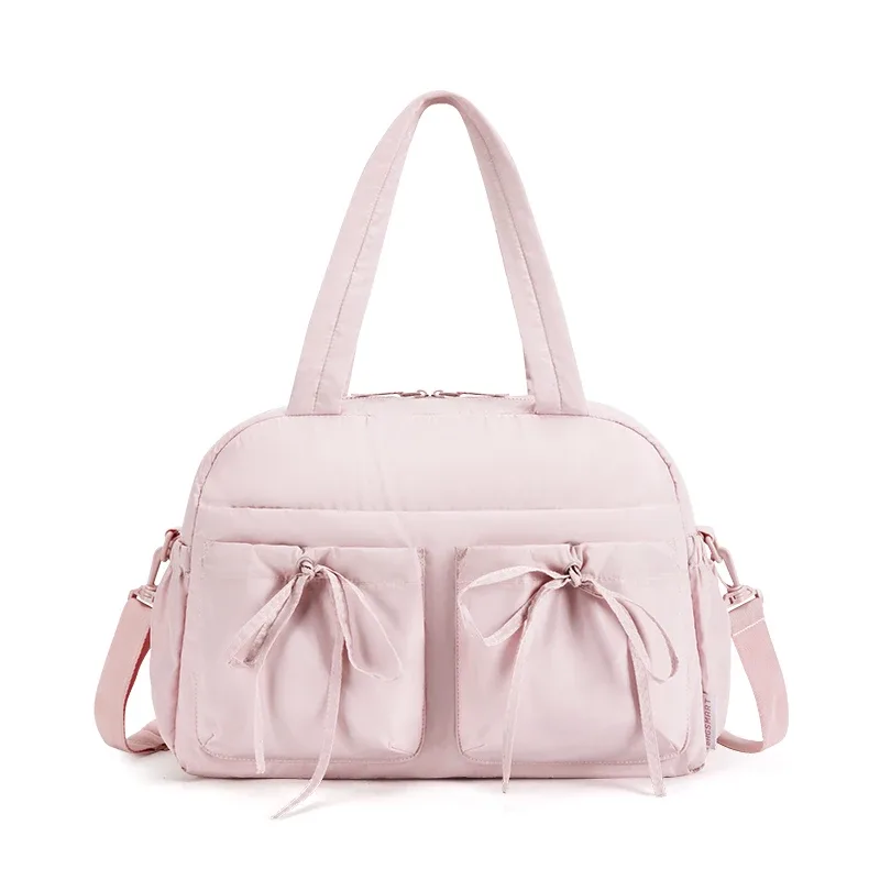 sac voyage polyester noir rose bandoulière poignée supérieure poches latérales grande capacité usage voyage sport loisirs