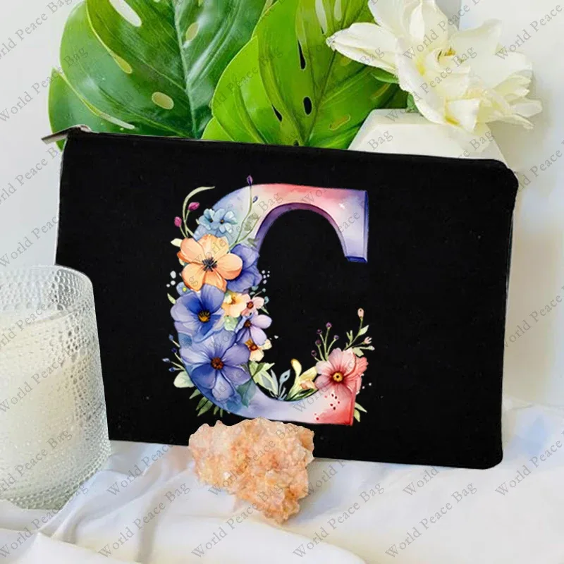 trousse toilette toile noire initiale fleurs maquillage femmes voyage sac cosmétiques intérieur uni poignée glissière
