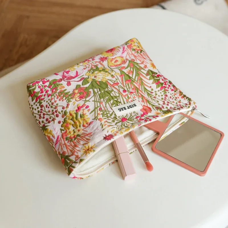 trousse toilette polyester floral fleur rose vert violet blanc motif géométrique marguerites bleu jaune voyage grande capacité
