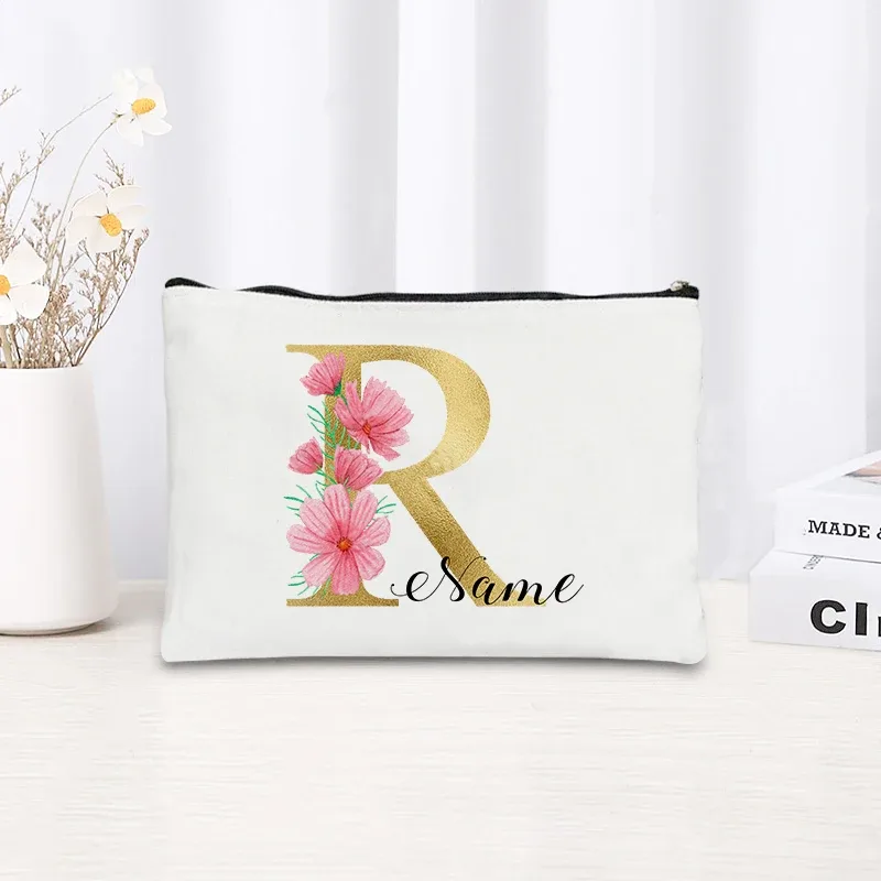 grande pochette zippée à motif floral rose et initiales dorées, organisateur d'essentiels de voyage en toile, trousse de maquillage pour enterrement de vie de jeune fille avec sac personnalisé avec nom.