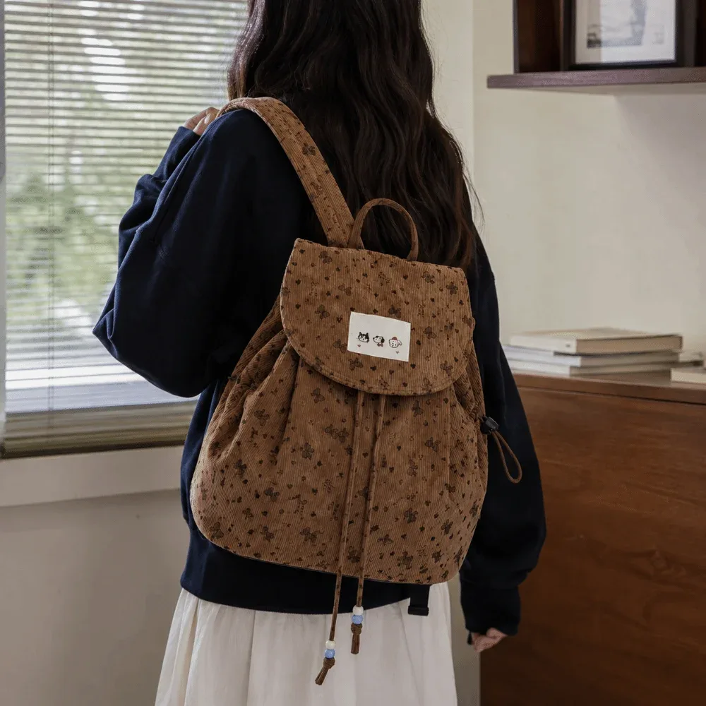 Sac à dos léger en velours côtelé à imprimé nœud papillon, design simple et décontracté, sac à dos à cordon de serrage, grande capacité, sac à livres polyvalent pour étudiant