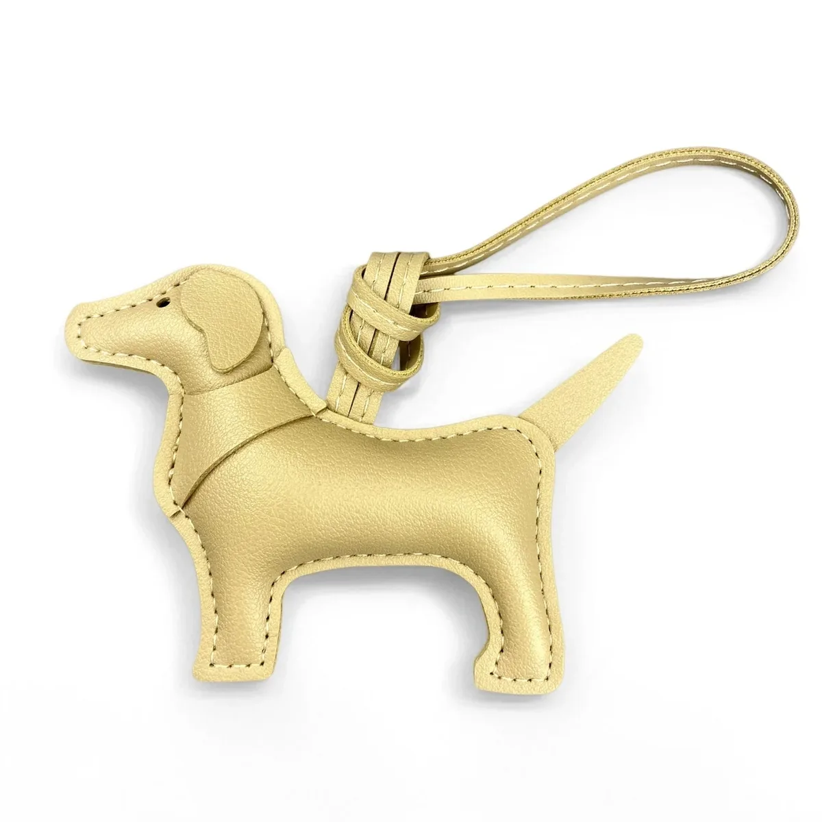 sac dos cuir motif chien silhouette orelles criniere couleurs contrastantes ornements voyage usage journee accessoires sac main porte clefs