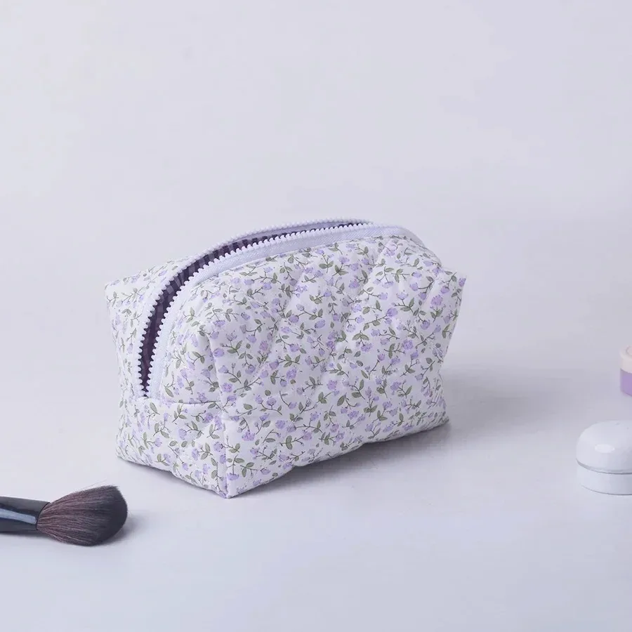 organisateur voyage polyester fleurs motifs multicolores sac compression usage cosmétiques rangement détails travail toilette transport