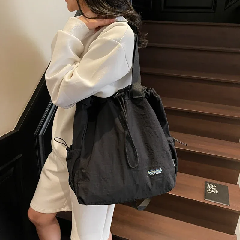 sac à mains femme sac à dos femme sac à dos voyage sacs à dos multifonctionnels pour femmes, en nylon, grande capacité, fourre-tout à bandoulière, seau à cordon de serrage, sac à dos de voyage