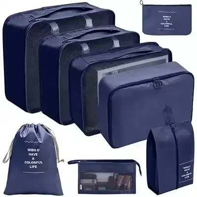 organisateur voyage polyester beige clair sac rangement vêtements chaussures sous-vêtements pochettes transparentes cubes modularité transport