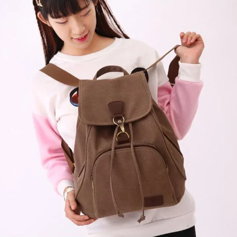sac dos toile femelle polyester poche intérieure zippée bandoulière arquée style preppy couleur marron clair capacité 20 35 litres