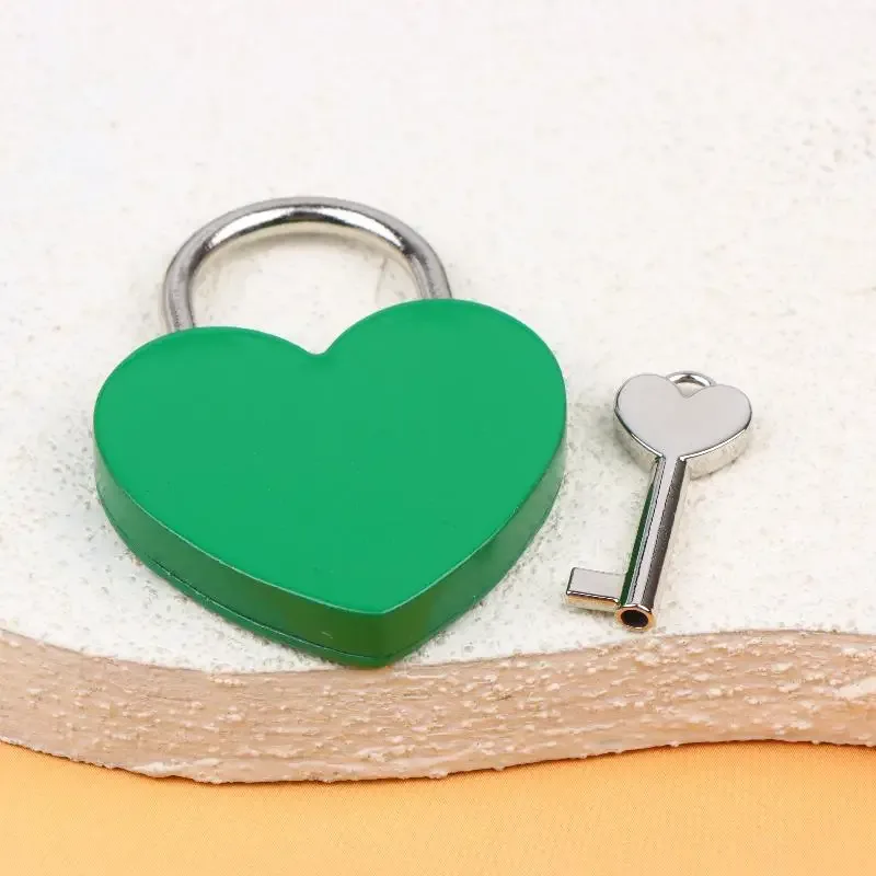 cadenas serrure tsa métal forme coeur couleurs vives marron dore rose rouge argent orange blanc usage voyage décoration objets personnels sécurité antivol