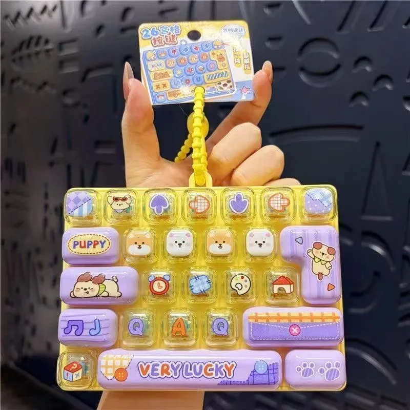 porte-clés portable à 26 touches de clavier pour sacs, sacs à dos, accessoire de costume d'halloween, jouet sensoriel de décompression pour le bout des doigts