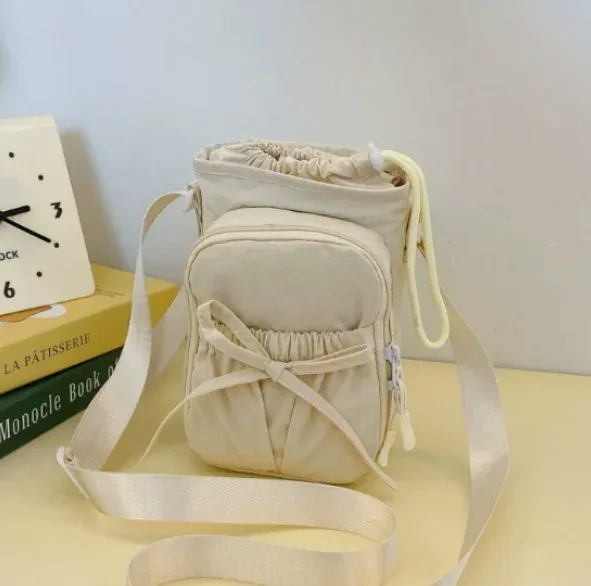 nouveau sac bandoulière léger pour téléphone portable pour femme, sac de sport extérieur, sac de cyclisme, porte-bouteille d'eau, sac de voyage, design à nœuds