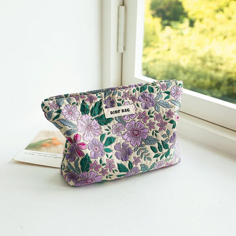 trousse toilette polyester floral fleur rose vert violet blanc motif géométrique marguerites bleu jaune voyage grande capacité