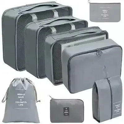 organisateur voyage polyester beige clair sac rangement vêtements chaussures sous-vêtements pochettes transparentes cubes modularité transport