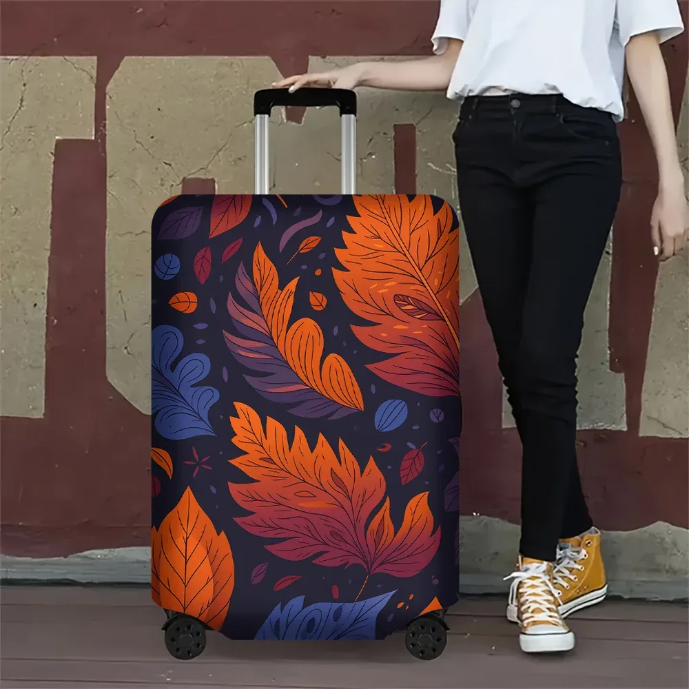 housse valise polyester motif feuilles colorées orange rouge violet fond noir protection voyage grande capacité transport