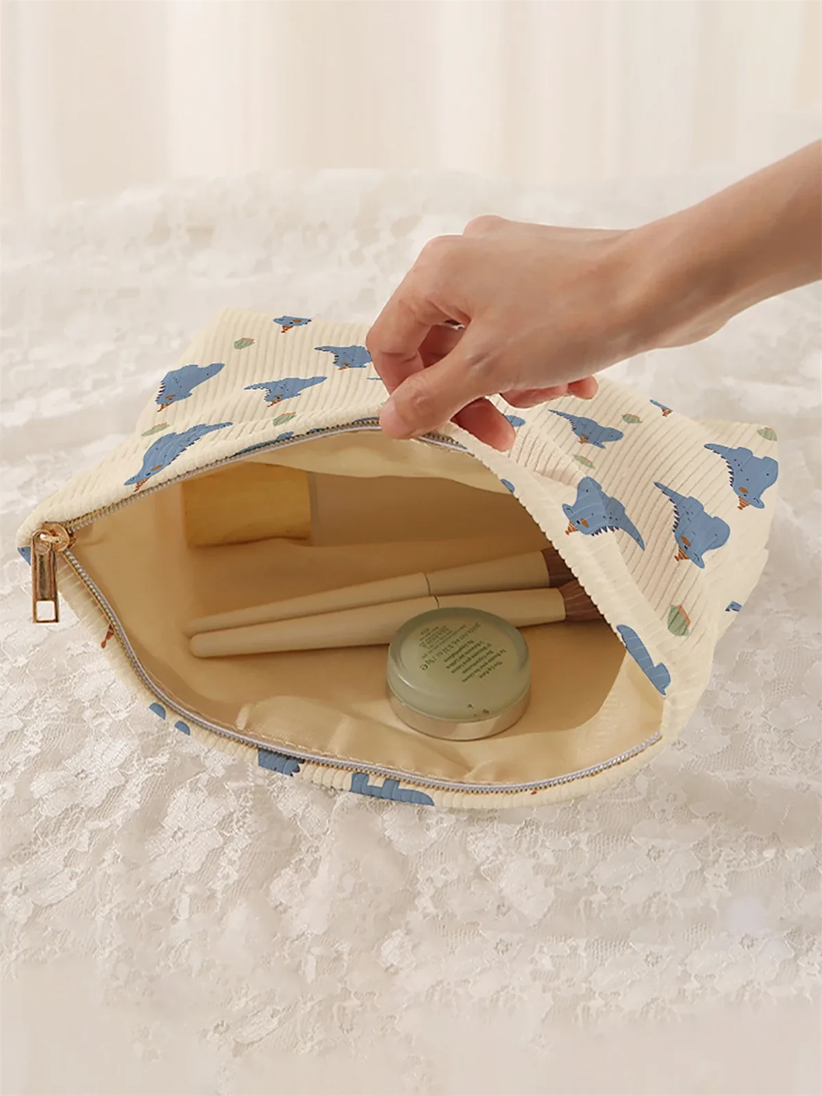 1 trousse de maquillage en velours côtelé à motifs de dinosaure de dessin animé, boîte de rangement de maquillage légère à fermeture éclair, sac multifonctionnel avec doublure