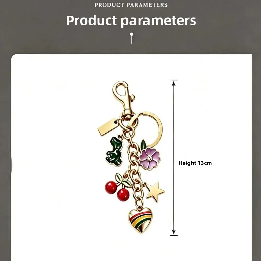 pince clé ornements charmes cerise fleur étoile cœur arc ciel métal doré marron rose décoration sac main porte clés accessoire voyage