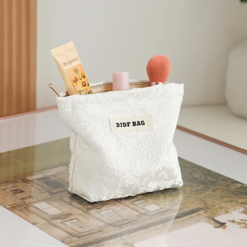 trousse polyester motif floral fleurs roses vertes fond blanc fermeture éclair voyage femmes cosmétiques maquillage sac rectangulaire
