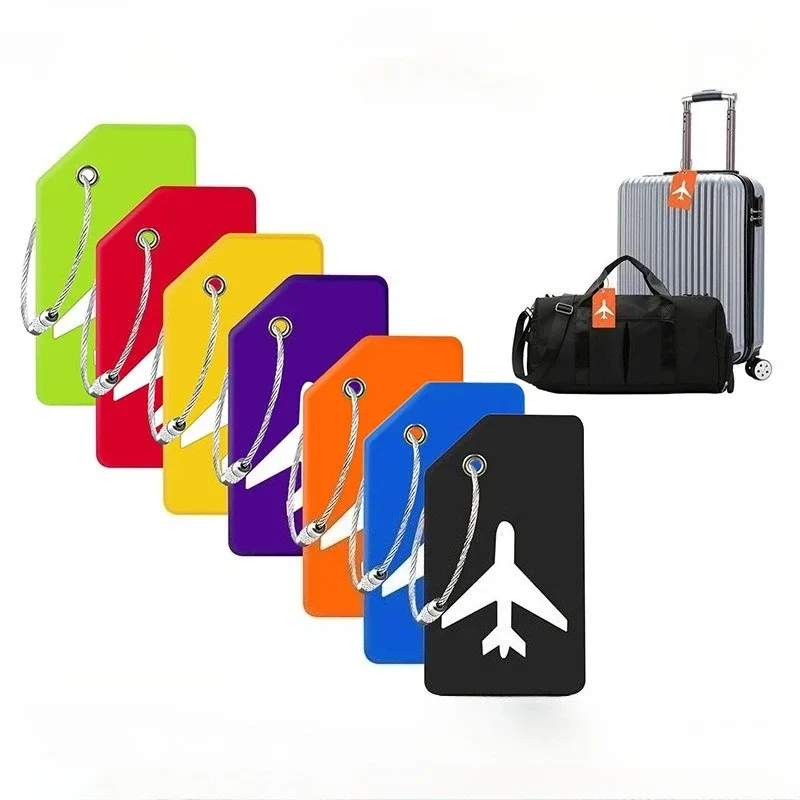 étiquette bagage plastique motif avion couleur rouge noir orange bleu vert jaune voyage identification valise sac dos main croisière