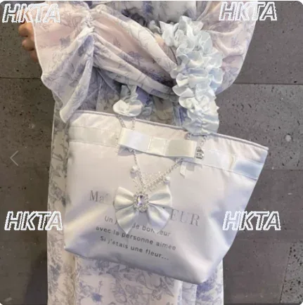 style japonais nouvelle lettre satin mignon nœud lolita portable sac fourre-tout femmes déplacements polyvalent plissé doux unique sac à bandoulière
