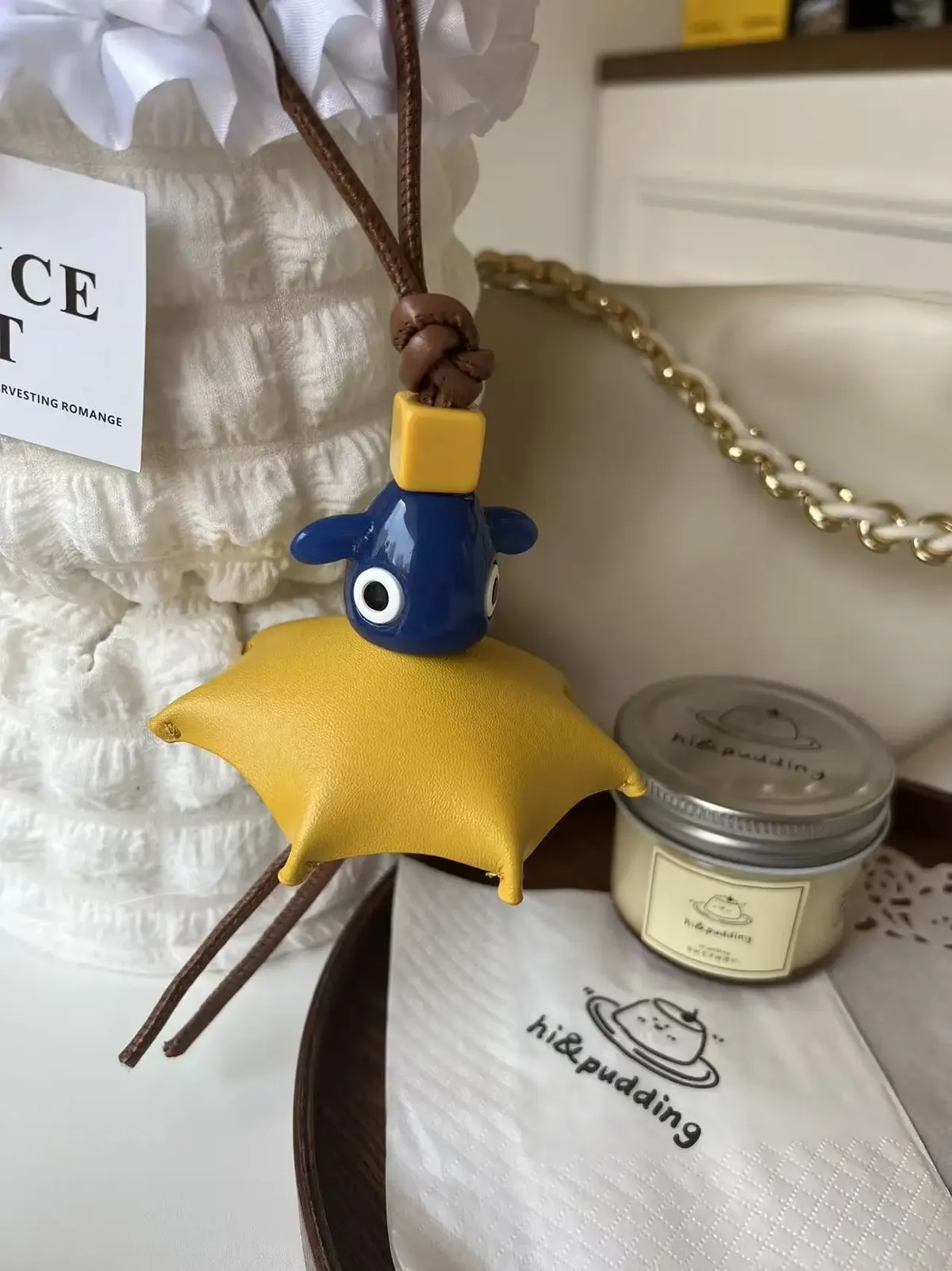 breloque de sac en cuir véritable avec grand œil et pompon, inspirée des créateurs de luxe, porte-clés à franges pour sacs à main, sacs à dos et accessoires de sac fourre-tout pour femmes