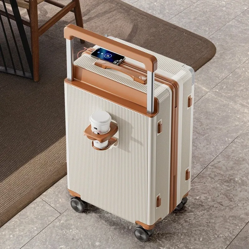 valise bagage roulettes abs beige clair marron toupie poignées bouton forme rectangulaire surface lisse texturée grande capacité usage voyage
