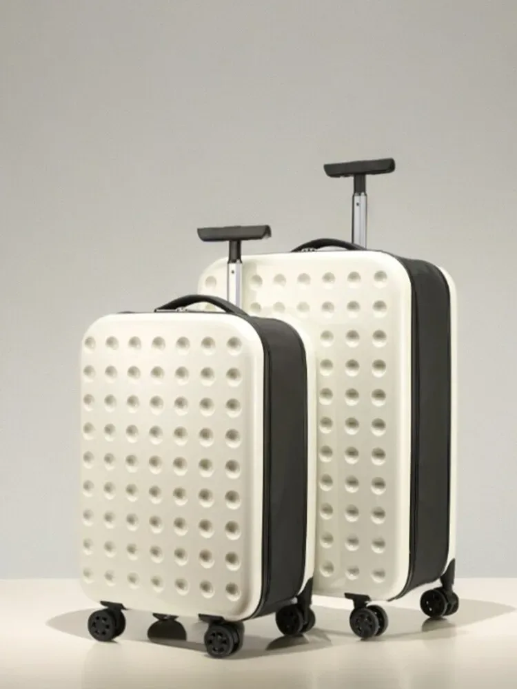 sac voyage polochon plastique dur crème points noirs roulettes poignée télescopique bandes noires grande taille