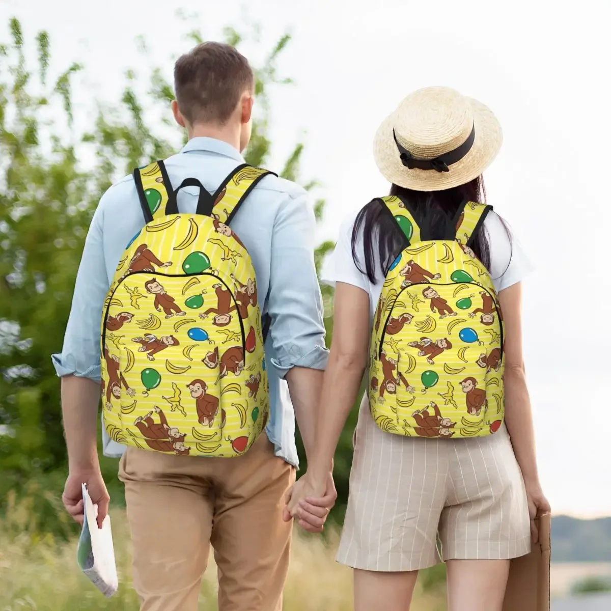 sac dos toile polyester jaune vif singes bananes ballons rayures horizontales poche intérieure fendue fermeture éclair transport journalier