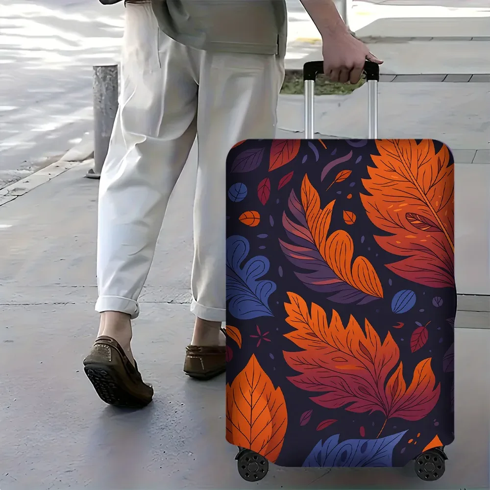 housse valise polyester motif feuilles colorées orange rouge violet fond noir protection voyage grande capacité transport