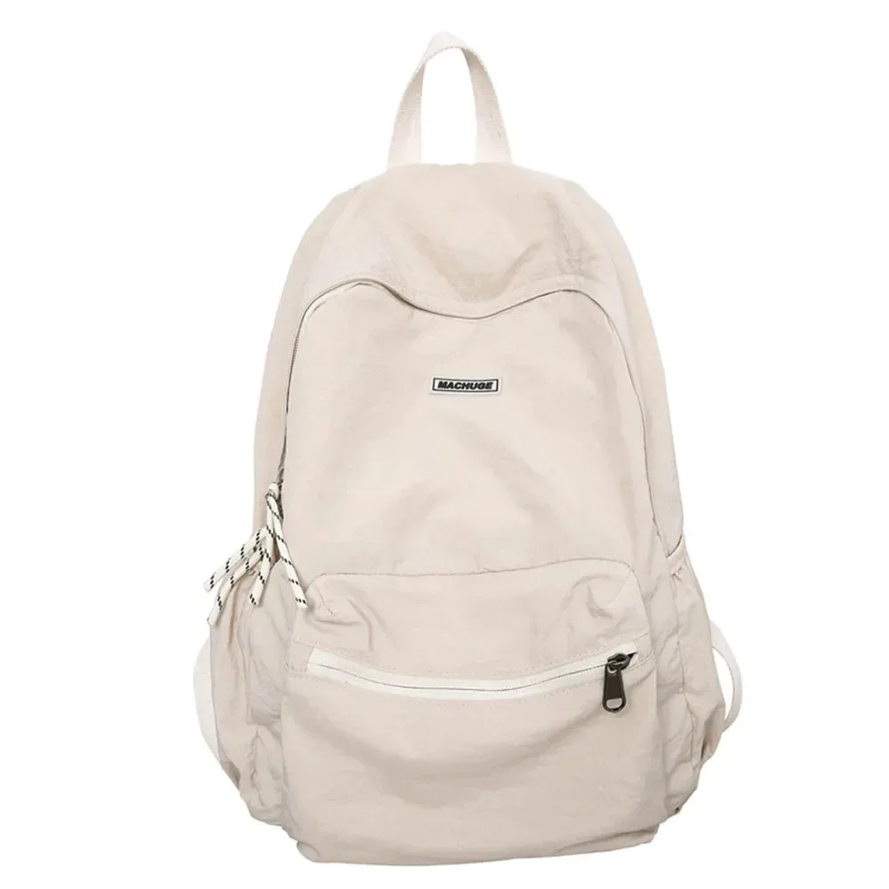 sac dos nylon beige clair pliable grande capacité bandoulière arquée poche intérieure zippée usage voyage décontracté