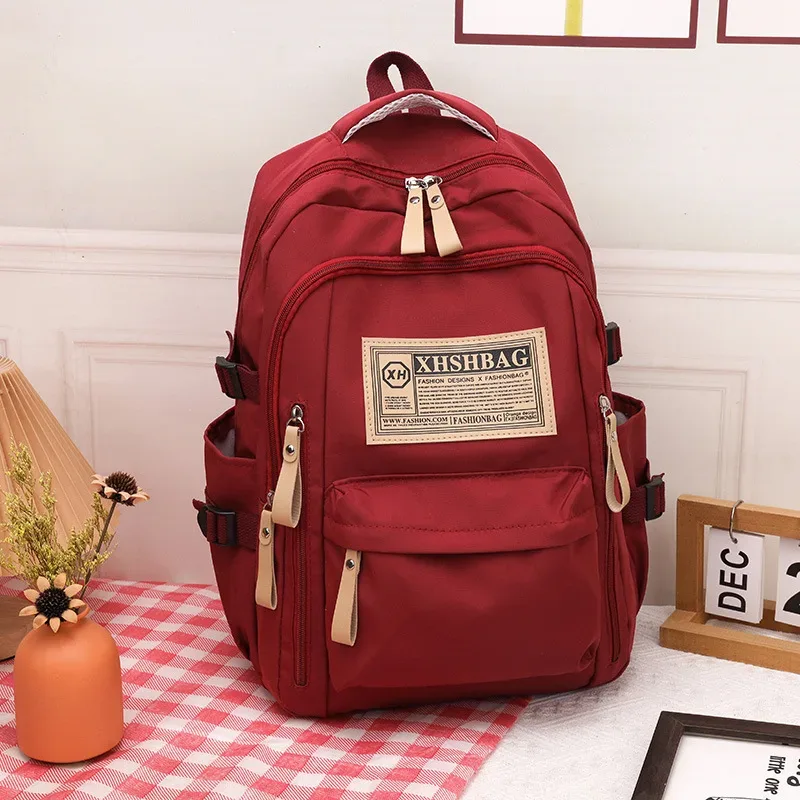 sac dos nylon solide beige rouge noir kaki décontracté poignée souple fermeture éclair usage journalier