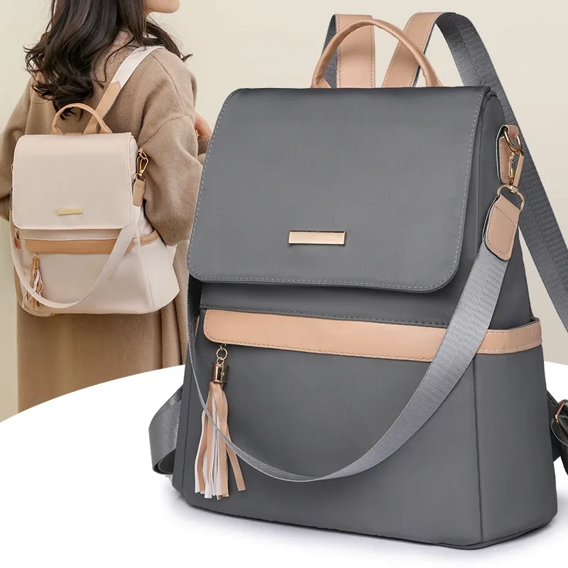sac dos polyester beige noir gris bandoulière poignée souple fermeture éclair integree usage voyage femenin classique