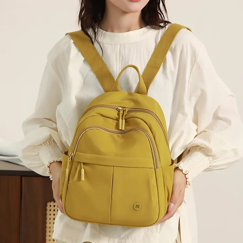 sac à dos léger 2025, nouveau style, sac d'école minimaliste de grande capacité pour femmes, petit sac à dos multifonctionnel de voyage