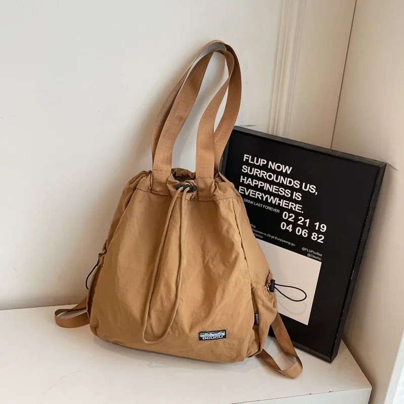 sac à mains femme sac à dos femme sac à dos voyage sacs à dos multifonctionnels pour femmes, en nylon, grande capacité, fourre-tout à bandoulière, seau à cordon de serrage, sac à dos de voyage