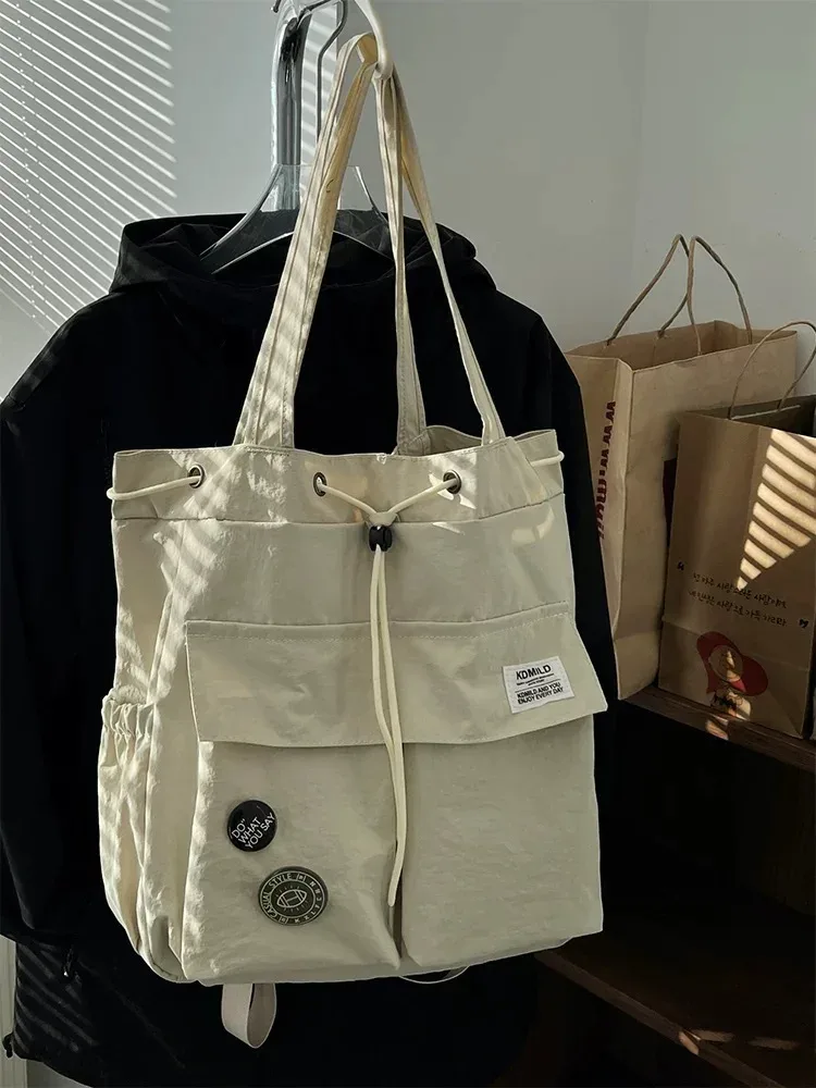 sac à dos léger et décontracté pour femme, idéal pour les voyages, les loisirs en plein air, en nylon, capacité 20-35l, avec compartiment pour ordinateur portable 14 pouces