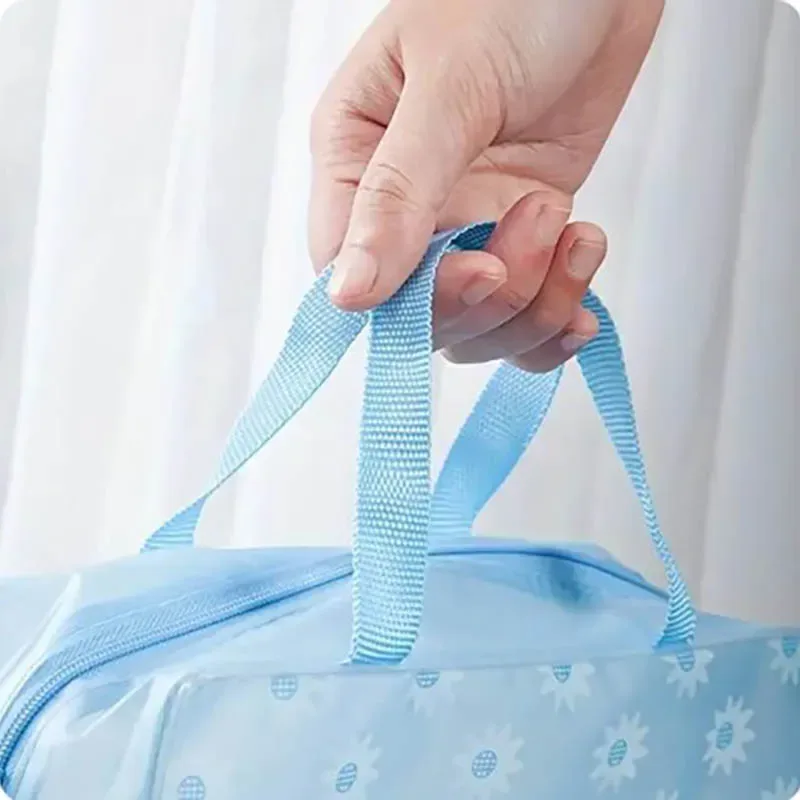 trousse toilette pvc transparent fleur blanche bleu poignée roue format petite valise voyage cosmétique maquillage