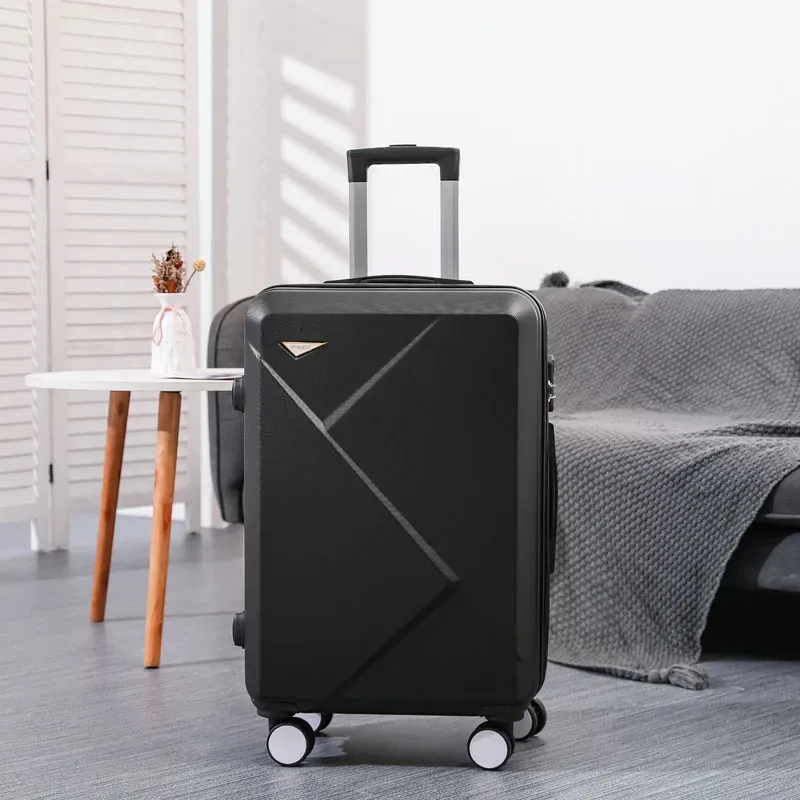 valise abs plastique dur motif géométrique lignes diagonales relief gris rose blanc jaune vert bleu rouge bagage affaires voyage