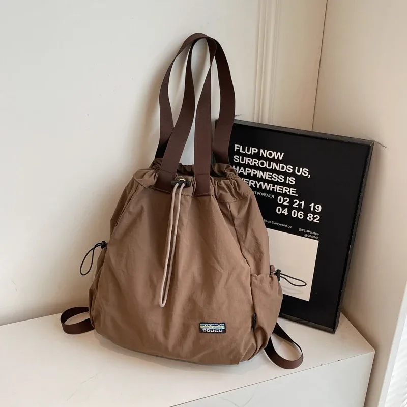 sac à mains femme sac à dos femme sac à dos voyage sacs à dos multifonctionnels pour femmes, en nylon, grande capacité, fourre-tout à bandoulière, seau à cordon de serrage, sac à dos de voyage