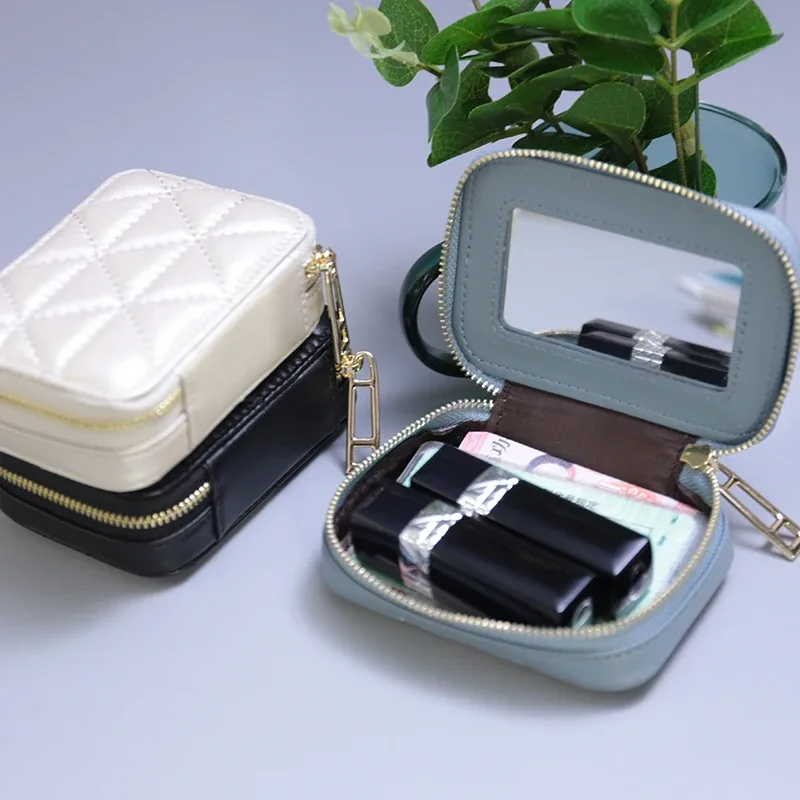organisateur voyage cuir vache motif rayé blanc noir rose bleu carré zip décontracté cosmétiques maquillage