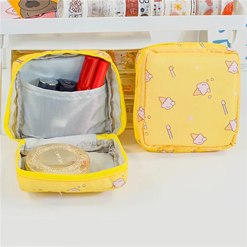 trousse toilette nylon imprimés animaux bleu rose noir blanc pastel voyage maquillage cosmétiques organiseur écouteurs monnaie