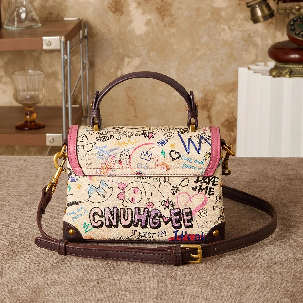 sac à main rétro graffiti avancé pour femmes, nouveau design de niche 2026, imprimé polyvalent, sac à bandoulière tendance.