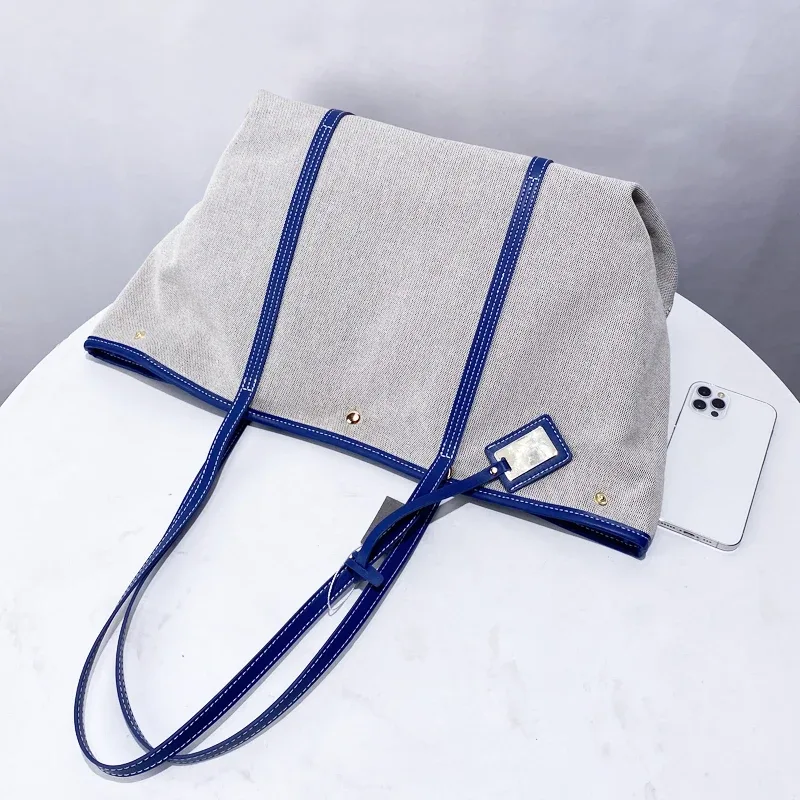 sacs fourre-tout de grande capacité pour les sacs à main et sac à main de concepteur de luxe 2025 nouveau dans décoration à paillettes sur le bouton sac à bandoulière en tissu des sous-bras haute qualité