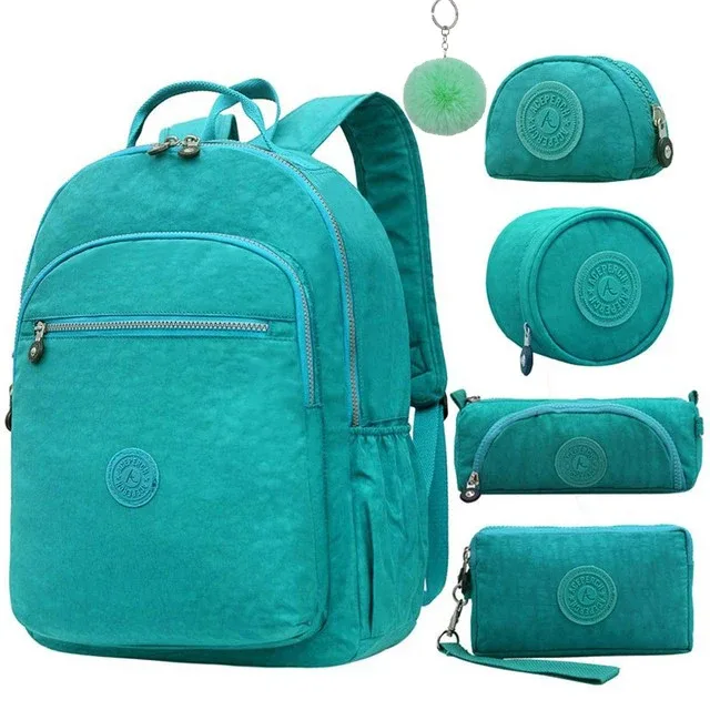 sac dos nylon gris anthracite compartiments poches latérales glissière accessoires pompon porte monnaie voyage école adolescente